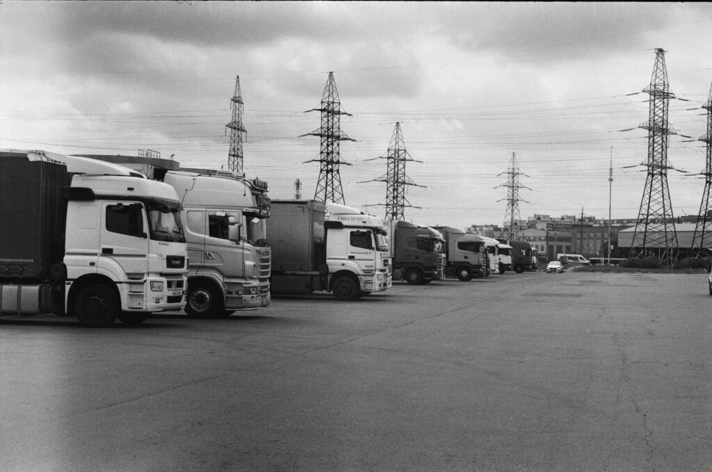 Row of trucks parked in a fleet yard
